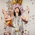 Woman Looking at Falling Confetti