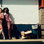 Woman in Orange Blazer