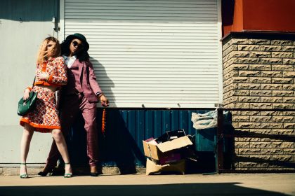 Woman in Orange Blazer